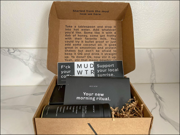 A box with a shipment of MUD/WTR and some extra bonuses