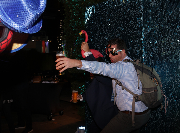Guests posing at the photo booth at the Maropost Reception at Content & Commerce Summit 2017