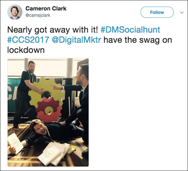 An Content & Commerce Summit attendee trying to "steal" books by DigitalMarketer